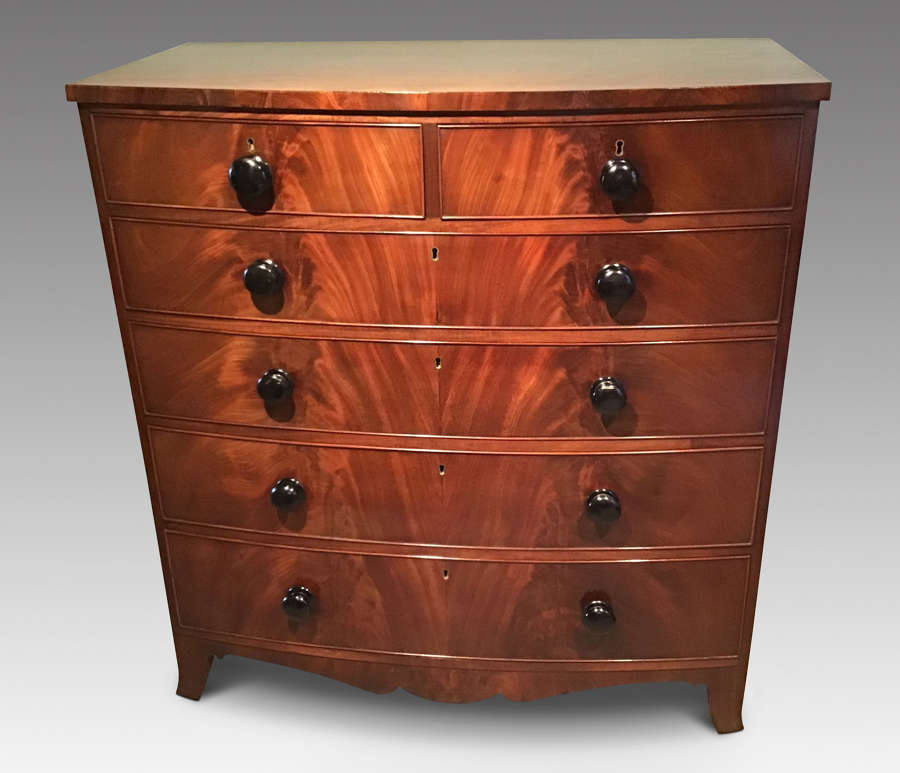 Antique mahogany bow front chest of drawers