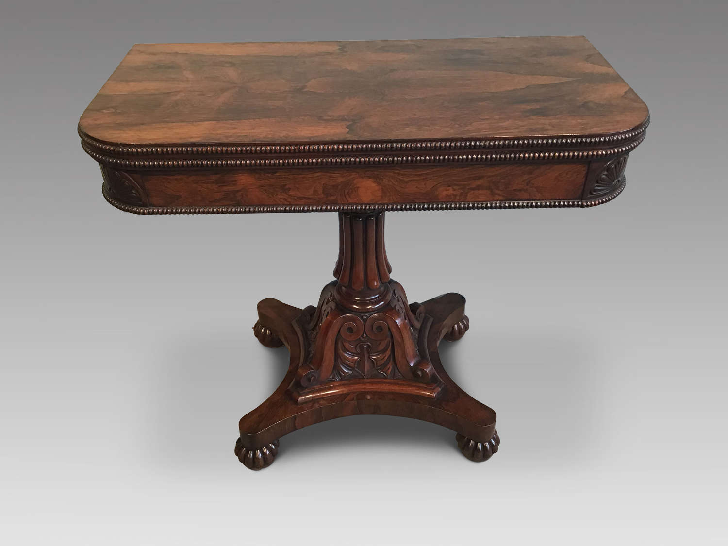 Antique rosewood tea table.