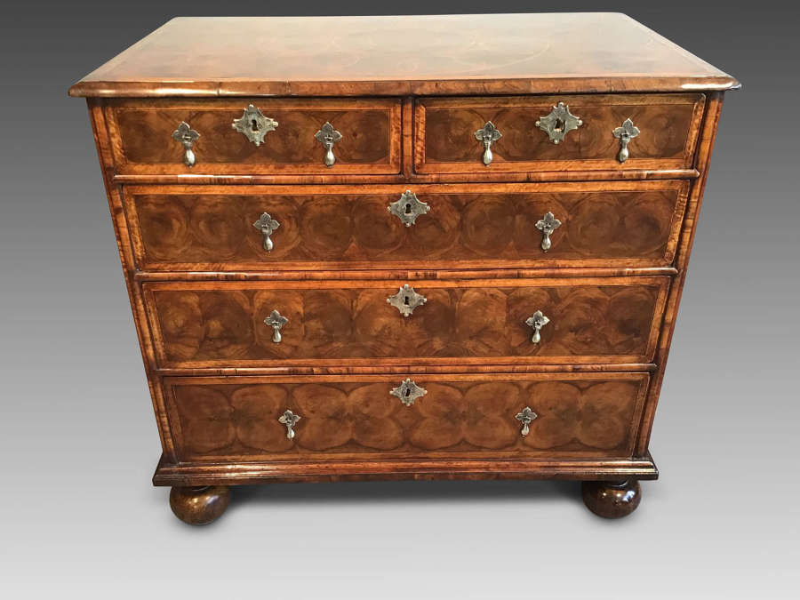 William and Mary oyster chest of drawers.