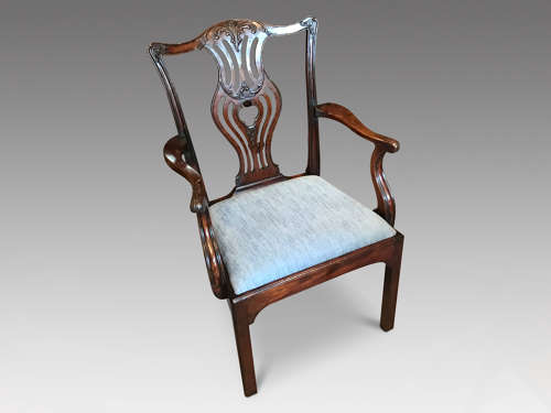 A Georgian mahogany elbow chair