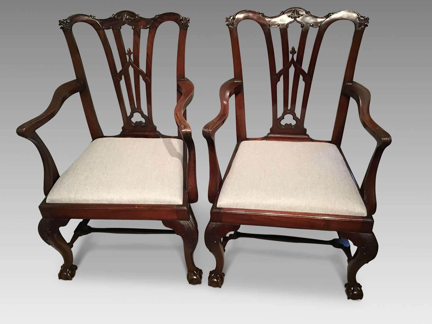 Pair of antique mahogany elbow chairs