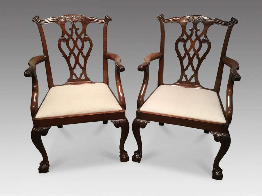 Pair of mahogany elbow chairs
