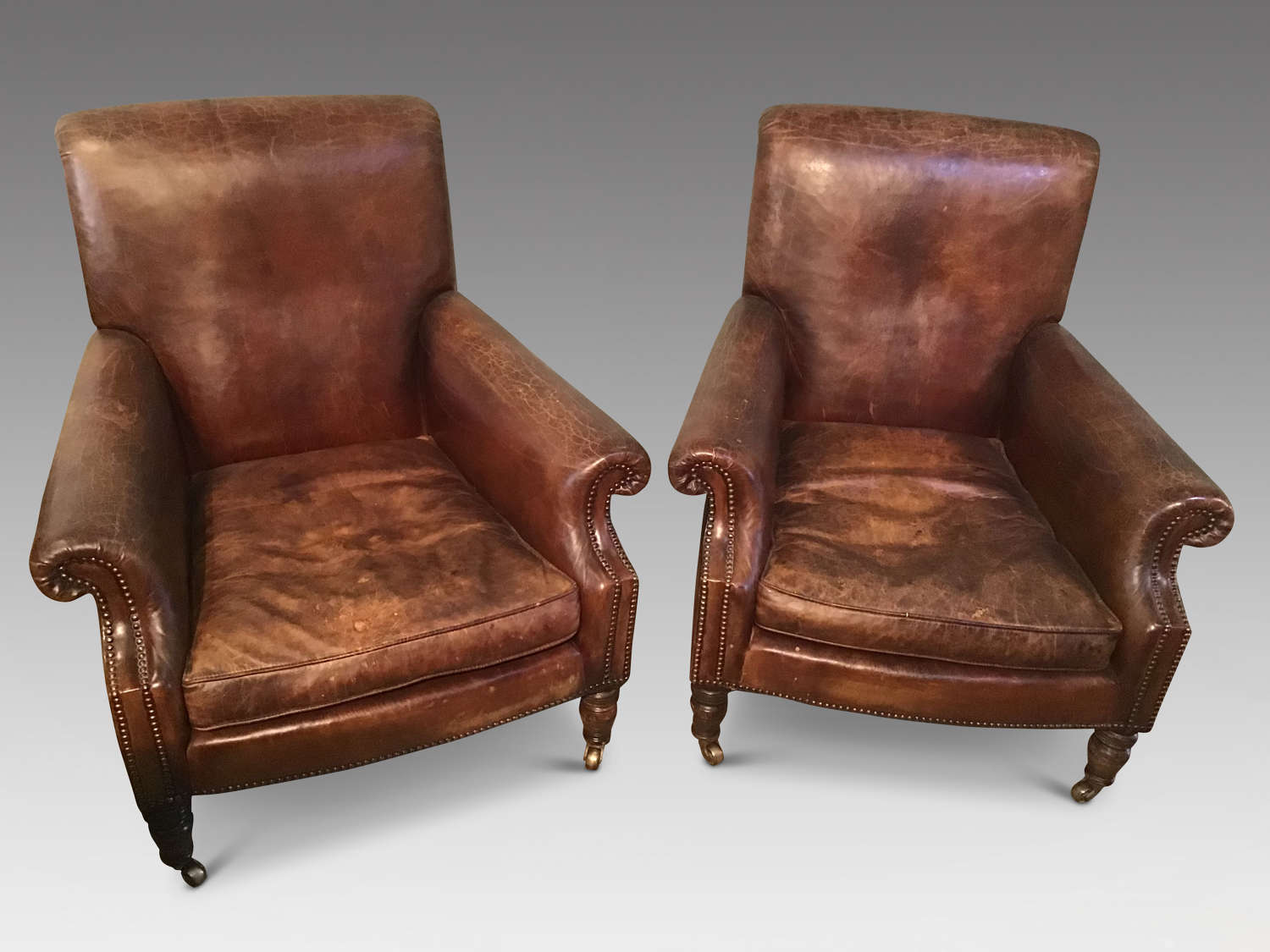 Pair leather easy chairs