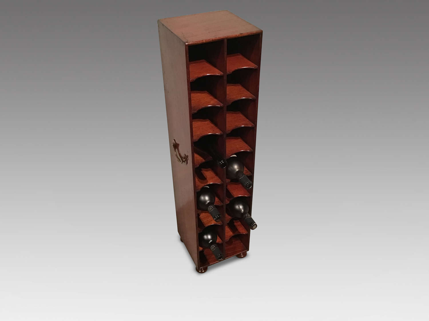 Antique mahogany wine rack.