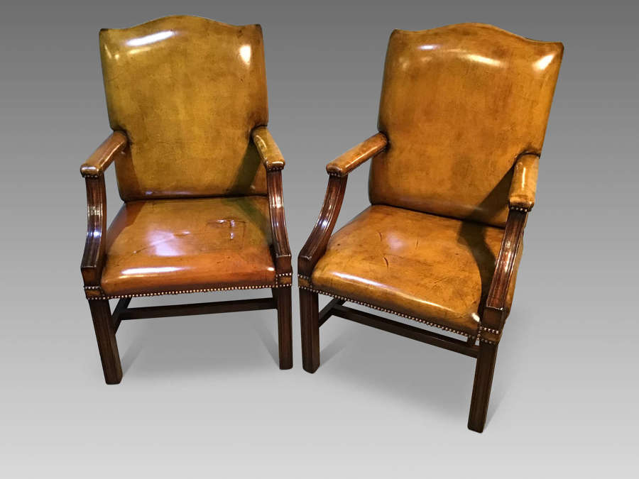 Pair of antique leather chairs