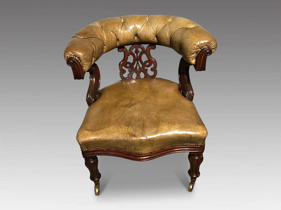 Antique mahogany and leather desk chair