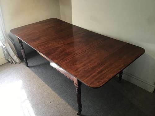 Antique Regency extending dining table