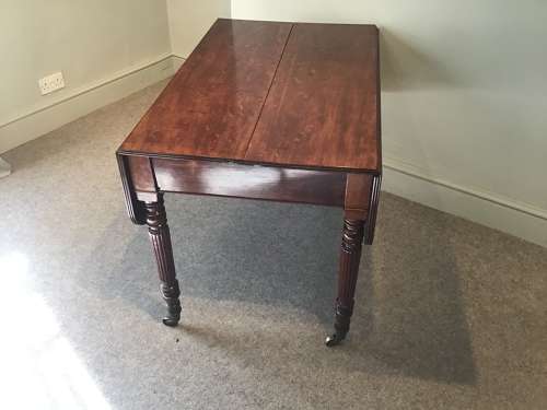 Antique Regency extending dining table