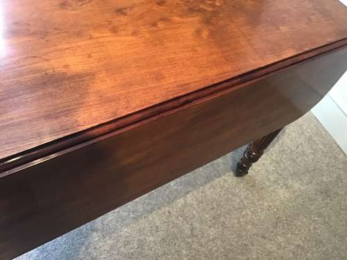 Antique Regency extending dining table