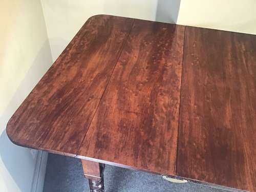 Antique Regency extending dining table