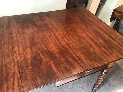 Antique Regency extending dining table