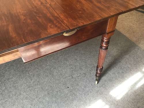 Antique Regency extending dining table