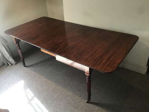 Antique Regency extending dining table