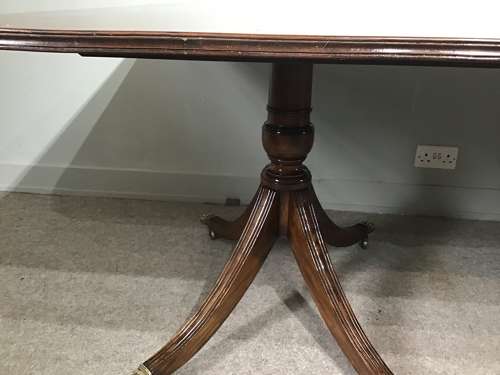 Antique mahogany pedestal dining table