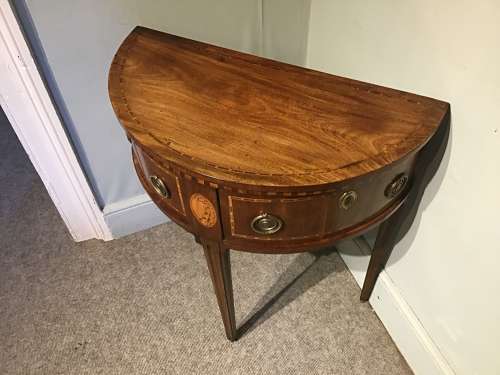Antique demi-lune sidetable