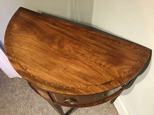 Antique demi-lune sidetable