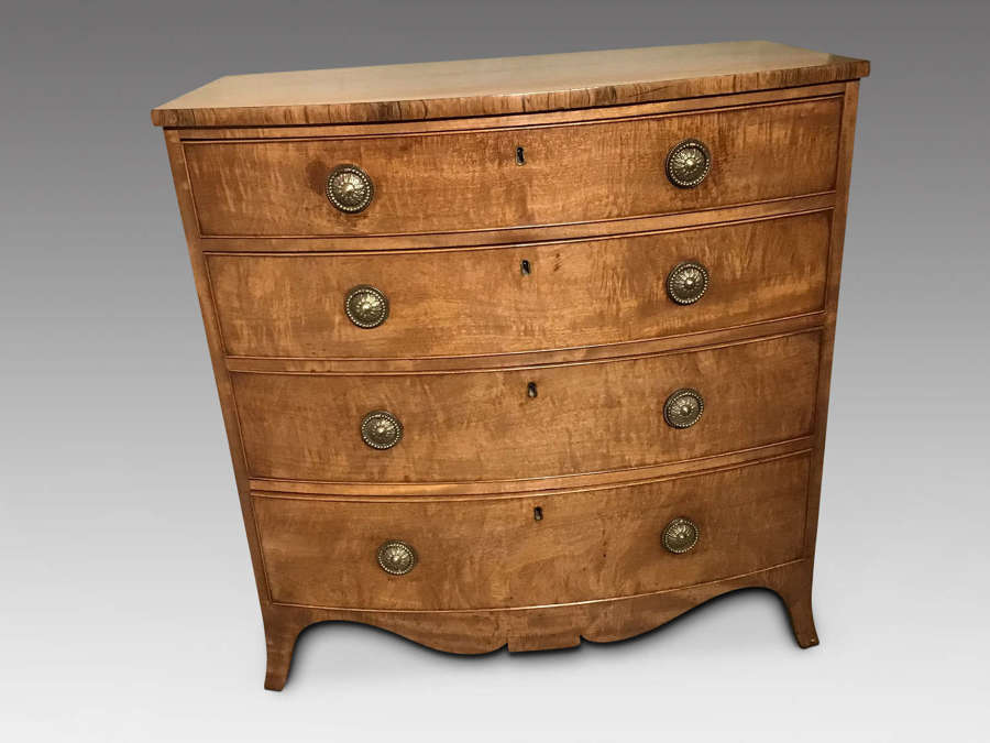 Antique bow front chest of drawers