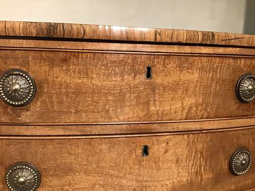 Antique bow front chest of drawers