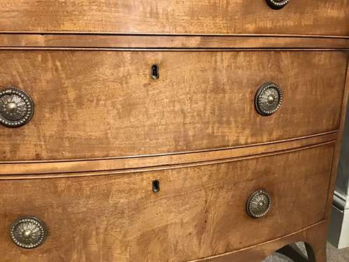 Antique bow front chest of drawers