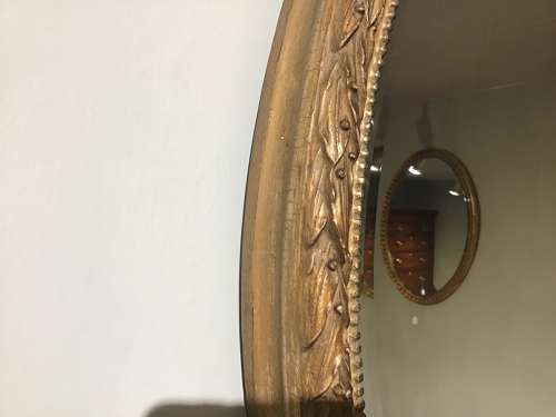 Antique oval gilt mirror