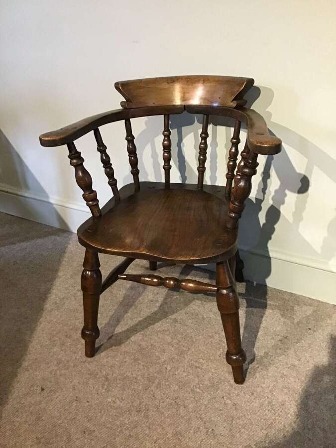 Antique smokers bow chair