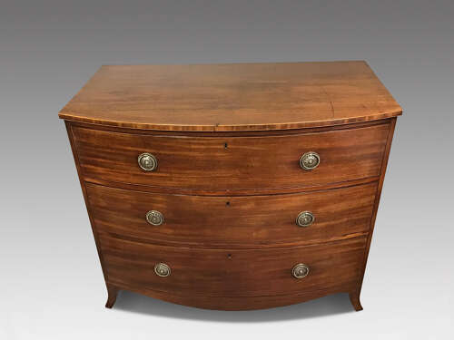 Antique mahogany bow front chest of drawers