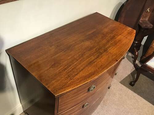 Antique mahogany bow front chest of drawers