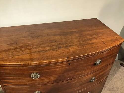 Antique mahogany bow front chest of drawers