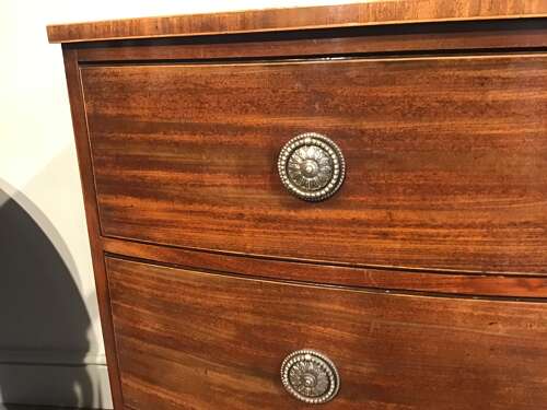 Antique mahogany bow front chest of drawers