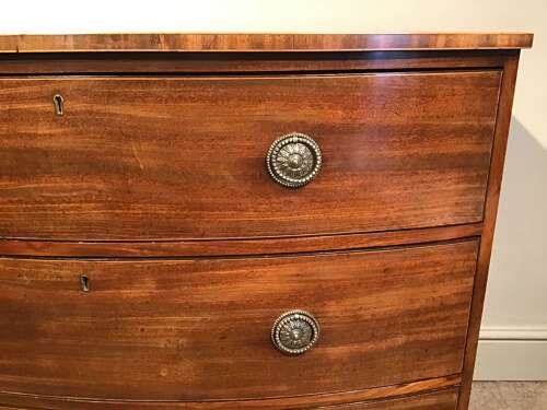 Antique mahogany bow front chest of drawers