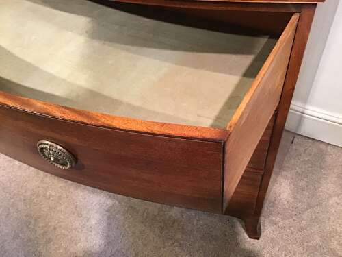 Antique mahogany bow front chest of drawers
