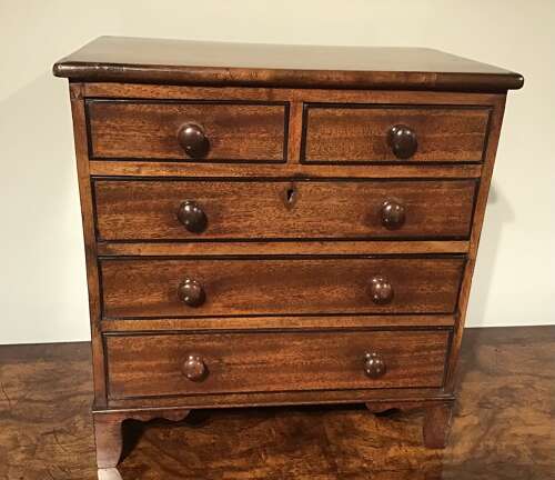 Antique miniature chest of drawers