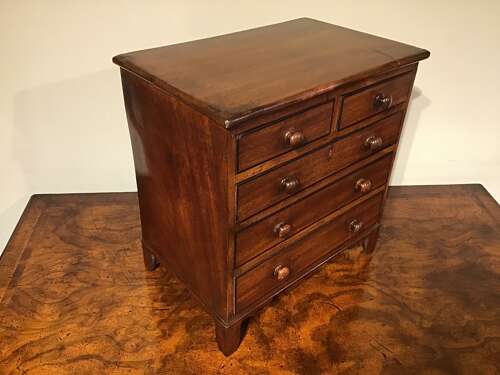 Antique miniature chest of drawers