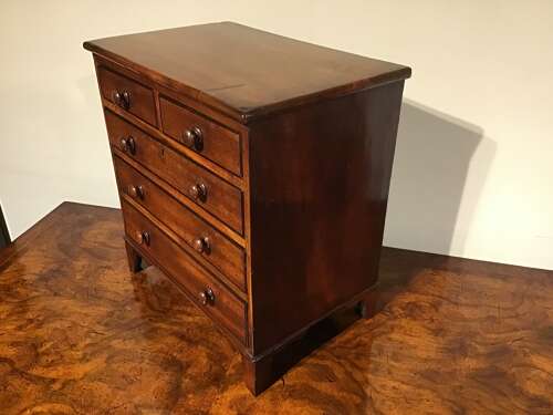 Antique miniature chest of drawers