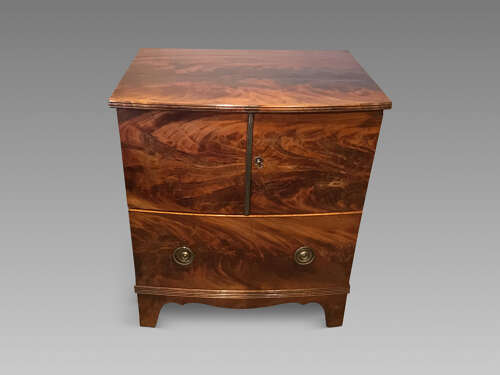 Antique bow front cabinet