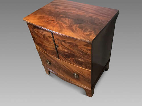 Antique bow front cabinet