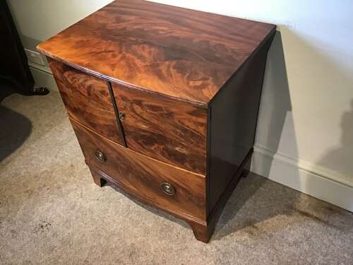 Antique bow front cabinet