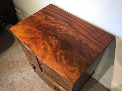 Antique bow front cabinet