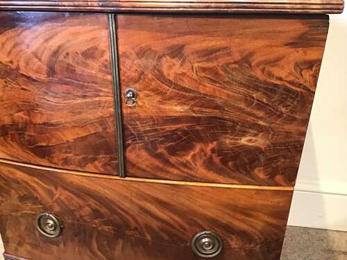 Antique bow front cabinet