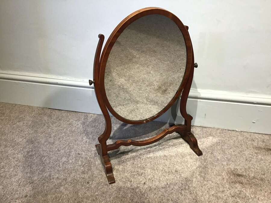 Antique skeleton frame mirror