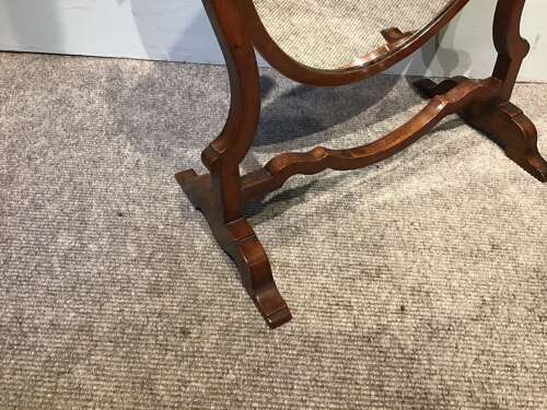 Antique skeleton frame mirror