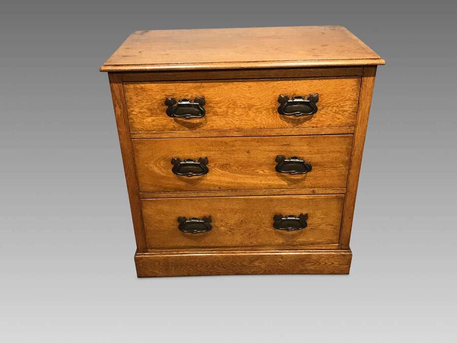 Arts and crafts oak chest of drawers