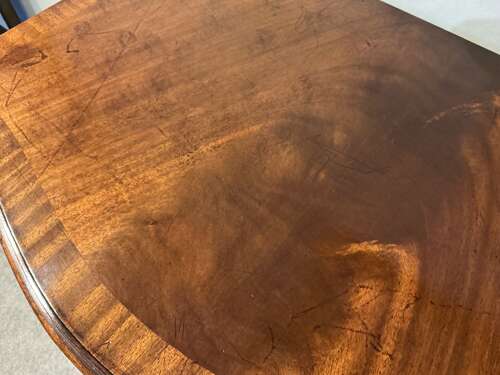 Antique mahogany serpentine chest of drawers.