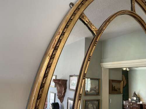 Antique oval gilt mirror.