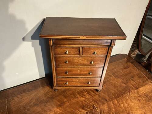 Antique miniature chest of drawers