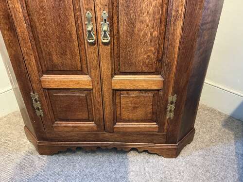 Antique oak corner cabinet